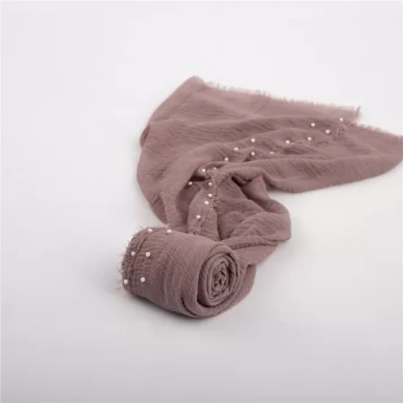 لفة قماش قطن باطراف من اللولو  لتصوير المواليد