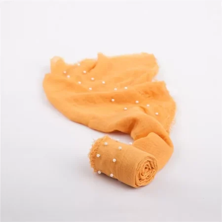 لفة قماش قطن باطراف من اللولو  لتصوير المواليد